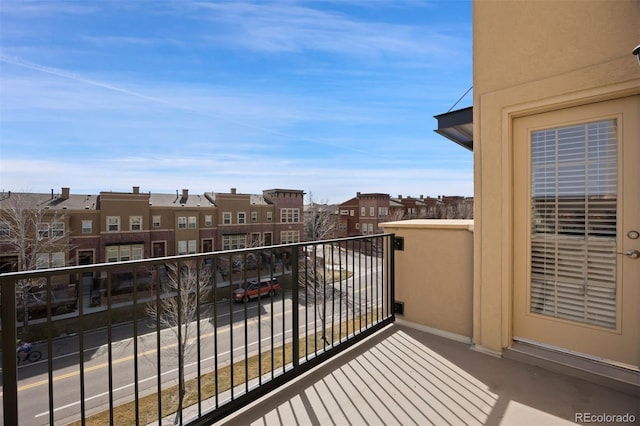 balcony featuring a residential view