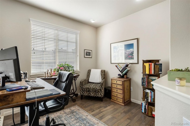 office with baseboards and wood-type flooring