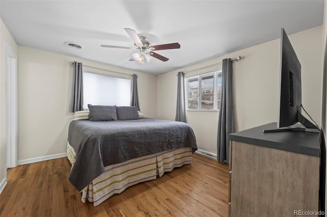 bedroom featuring ceiling fan and wood-type flooring