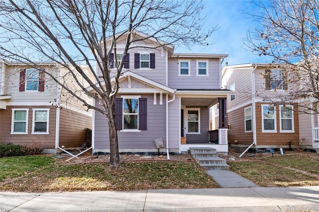 view of front of property featuring covered porch