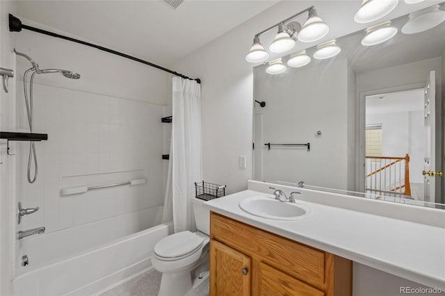 full bathroom featuring vanity, shower / tub combo, and toilet