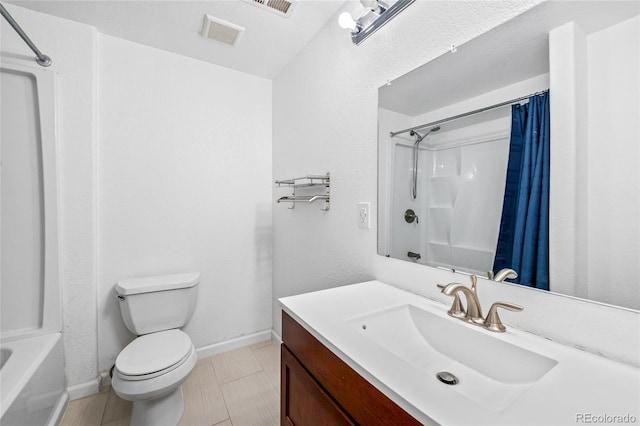 full bathroom featuring tile patterned flooring, vanity, toilet, and shower / bathtub combination with curtain