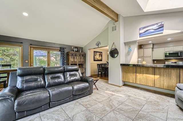 8600 W 2nd Ave, Lakewood, CO 80226 - living area featuring beamed ceiling, baseboards, high vaulted ceiling, and recessed lighting