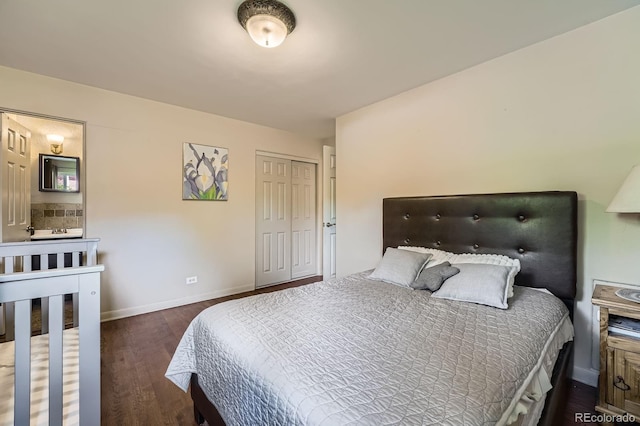 8600 W 2nd Ave, Lakewood, CO 80226 - bedroom with wood finished floors, baseboards, and a closet