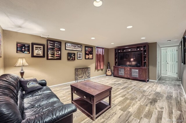 8600 W 2nd Ave, Lakewood, CO 80226 - living room featuring wood finished floors, baseboards, and recessed lighting