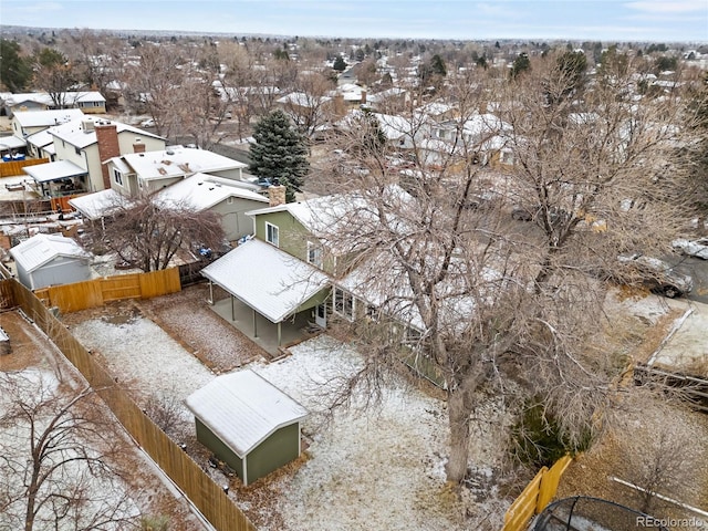 birds eye view of property with a residential view