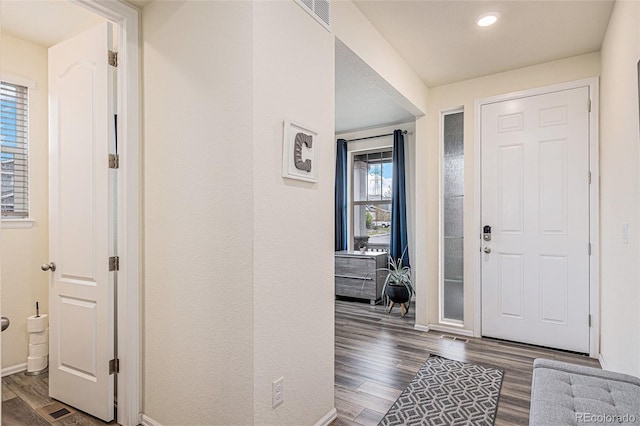 26385 E Canal Pl, Aurora, CO 80018 - entryway with wood finished floors, baseboards, and recessed lighting
