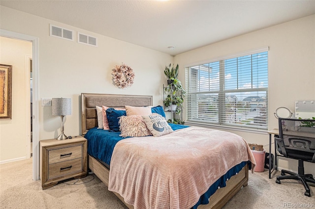 26385 E Canal Pl, Aurora, CO 80018 - bedroom featuring light colored carpet and baseboards