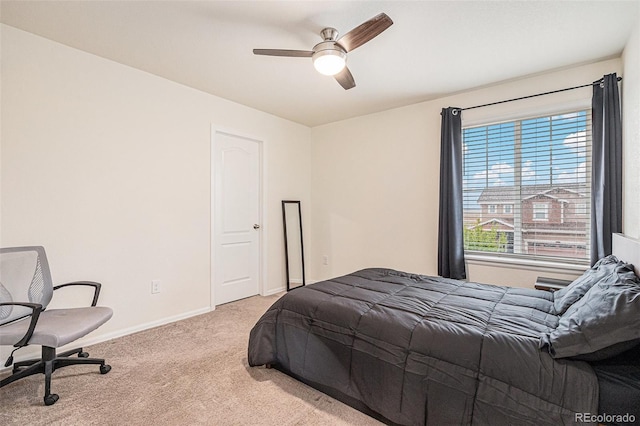 26385 E Canal Pl, Aurora, CO 80018 - bedroom featuring light colored carpet, baseboards, and a ceiling fan
