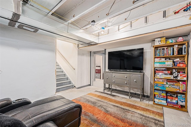 26385 E Canal Pl, Aurora, CO 80018 - living area with stairs and concrete flooring