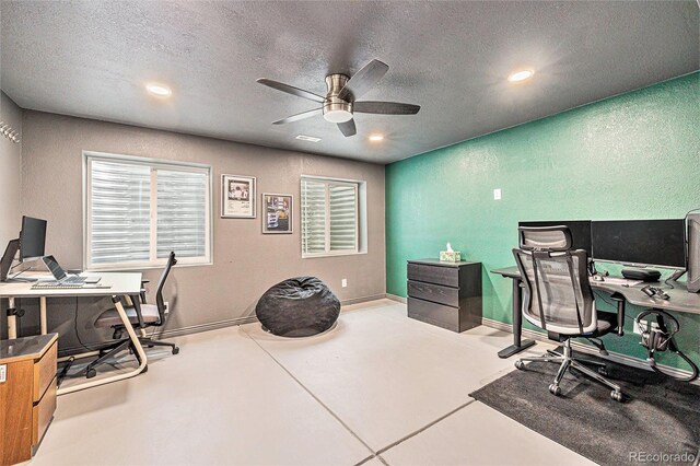 26385 E Canal Pl, Aurora, CO 80018 - office space featuring a ceiling fan, a textured ceiling, recessed lighting, baseboards, and concrete flooring