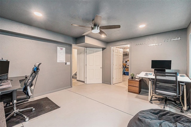 26385 E Canal Pl, Aurora, CO 80018 - office area with concrete floors, a ceiling fan, recessed lighting, and a textured ceiling