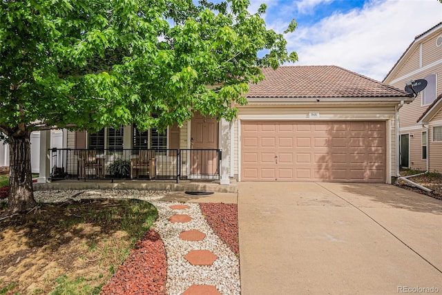 19481 E 50th Pl, Denver, CO 80249 - view of front of home with an attached garage, driveway, and a porch