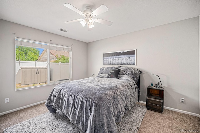19481 E 50th Pl, Denver, CO 80249 - bedroom with baseboards, carpet flooring, and ceiling fan