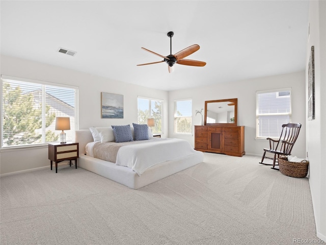 bedroom with baseboards, carpet, and ceiling fan