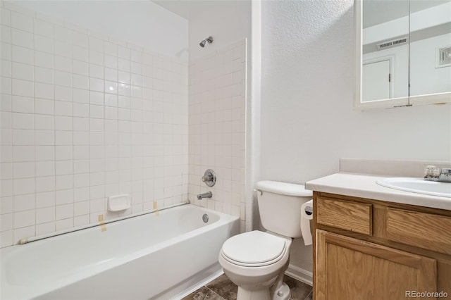 bathroom featuring visible vents, shower / tub combination, vanity, and toilet