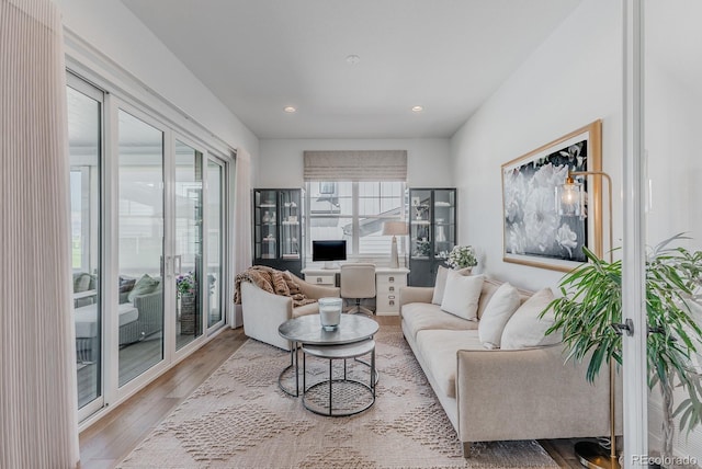 2141 Fountain Cir, Erie, CO 80516 - living room with wood finished floors and recessed lighting