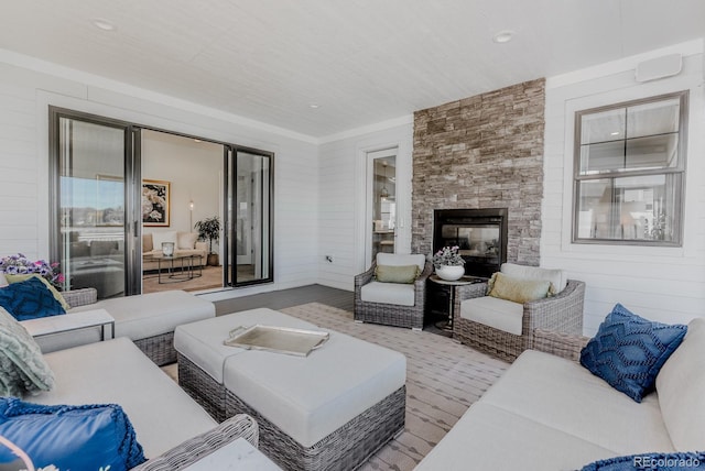 2141 Fountain Cir, Erie, CO 80516 - carpeted living area featuring an outdoor stone fireplace