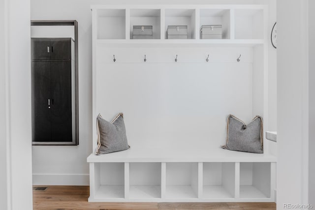 2141 Fountain Cir, Erie, CO 80516 - mudroom featuring wood finished floors and baseboards