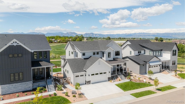 2141 Fountain Cir, Erie, CO 80516 - aerial perspective of suburban area with a mountain backdrop