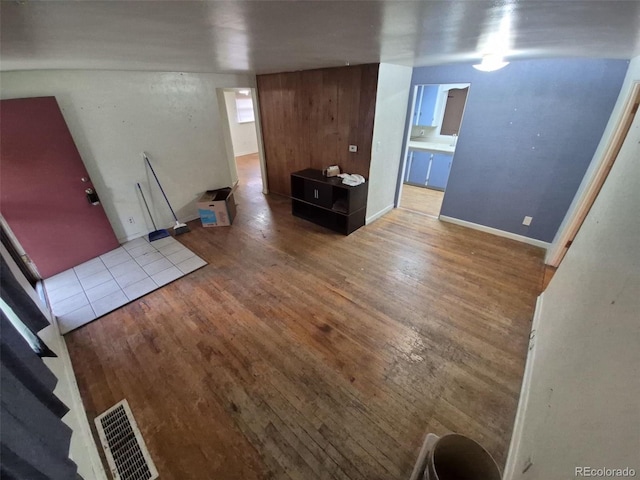 1078 Elmira St, Aurora, CO 80010 - unfurnished living room featuring wood finished floors