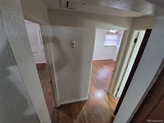 1078 Elmira St, Aurora, CO 80010 - hallway with wood finished floors and baseboards