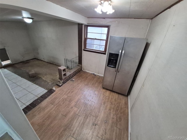 1078 Elmira St, Aurora, CO 80010 - kitchen featuring stainless steel refrigerator with ice dispenser and wood finished floors