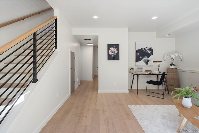 corridor with recessed lighting, wood finished floors, visible vents, and baseboards