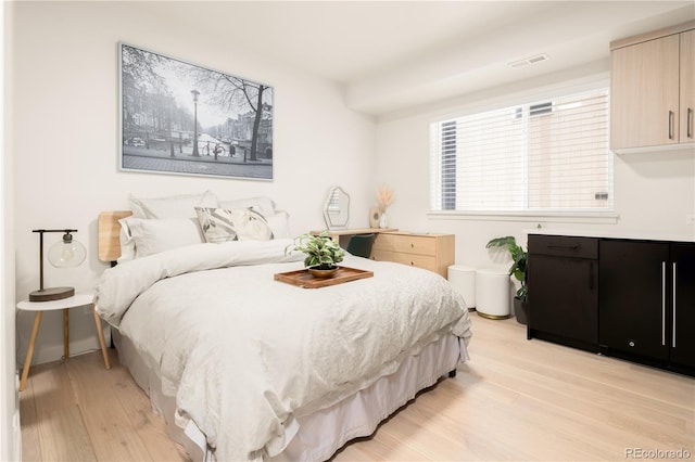 1262 N Stuart St Unit 2, Denver, CO 80204 - bedroom featuring light wood finished floors