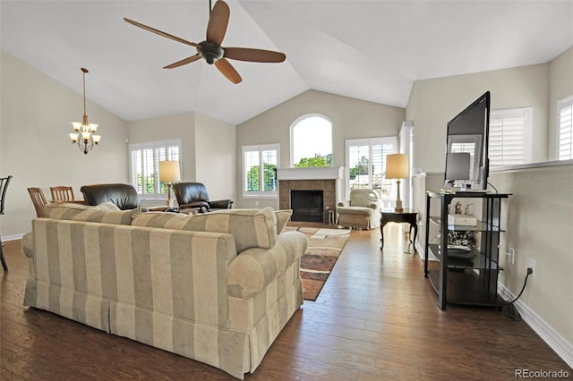 3325 W 111th Loop Unit C, Westminster, CO 80031 - living area with ceiling fan, dark wood-style flooring, vaulted ceiling, a chandelier, and a tile fireplace
