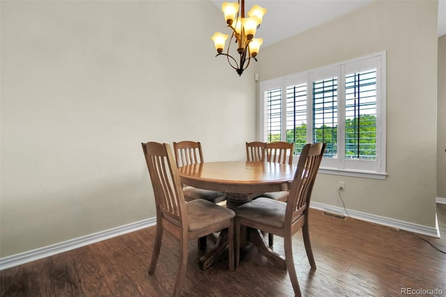 3325 W 111th Loop Unit C, Westminster, CO 80031 - dining room with a chandelier and wood finished floors