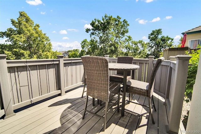 3325 W 111th Loop Unit C, Westminster, CO 80031 - wooden terrace featuring outdoor dining space