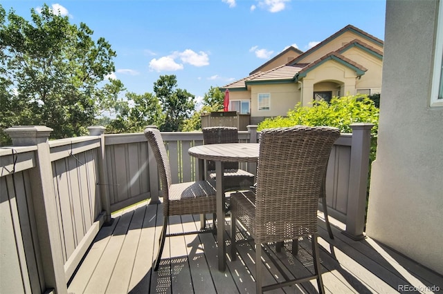 3325 W 111th Loop Unit C, Westminster, CO 80031 - wooden deck with outdoor dining area