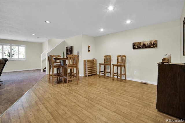 3325 W 111th Loop Unit C, Westminster, CO 80031 - dining room with recessed lighting, stairs, and wood finished floors