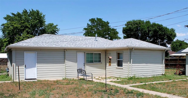 933 Skeel St, Brighton, CO 80601 - view of front facade featuring a shingled roof