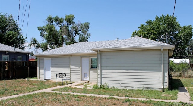 933 Skeel St, Brighton, CO 80601 - view of front of house featuring roof with shingles