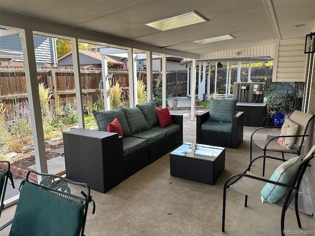 sunroom / solarium featuring a healthy amount of sunlight