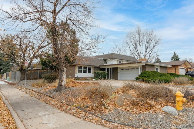 ranch-style home with a garage