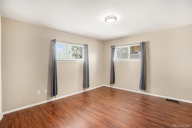 529 S Prospect St, Colorado Springs, CO 80903 - spare room featuring plenty of natural light and wood finished floors