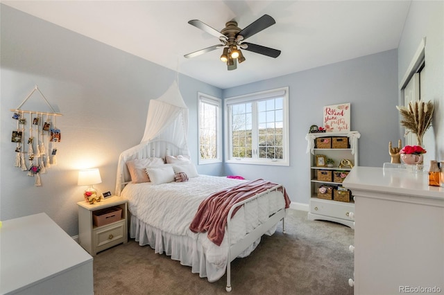 bedroom featuring carpet floors, ceiling fan, and baseboards