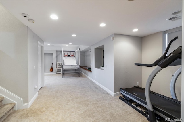 exercise area featuring carpet, recessed lighting, and baseboards