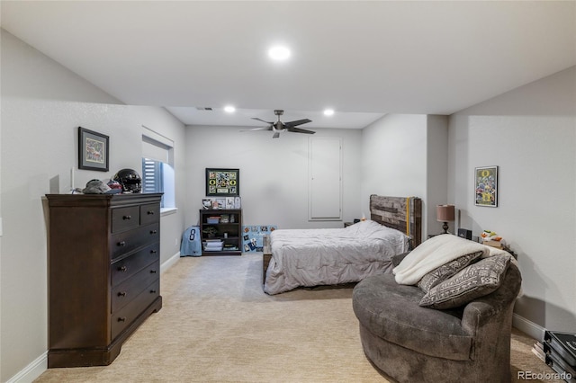 bedroom featuring light colored carpet, recessed lighting, a ceiling fan, and baseboards