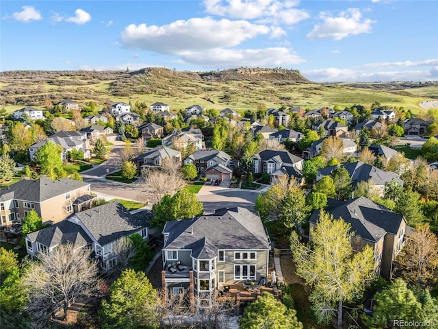aerial perspective of suburban area with mountains