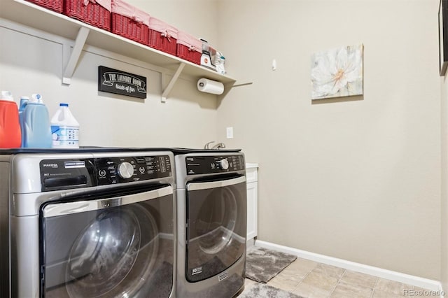 clothes washing area featuring washing machine and dryer