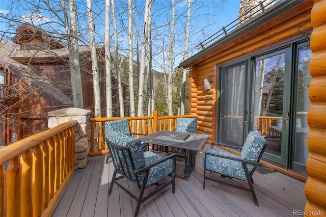 105 Windflower Ln, Frisco, CO 80443 - wooden deck with outdoor dining area
