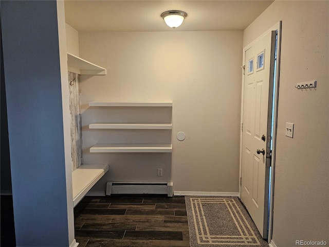 interior space with dark hardwood / wood-style flooring and a baseboard radiator