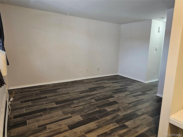 empty room featuring dark hardwood / wood-style floors