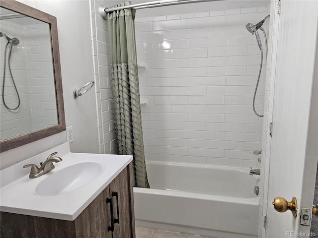 bathroom featuring shower / bathtub combination with curtain, vanity, and tile patterned floors