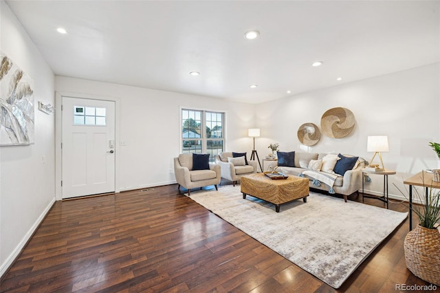 living room featuring dark hardwood / wood-style floors