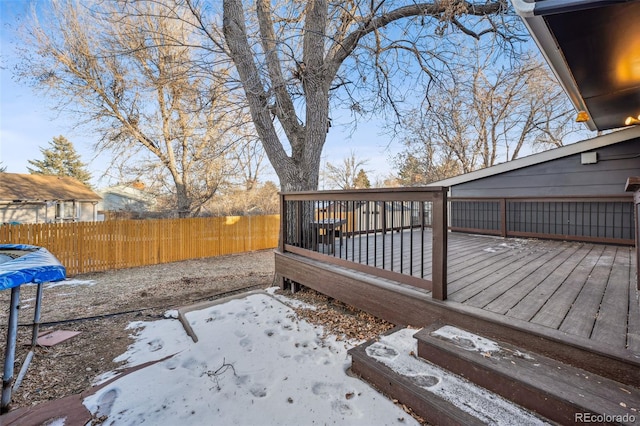 view of snow covered deck